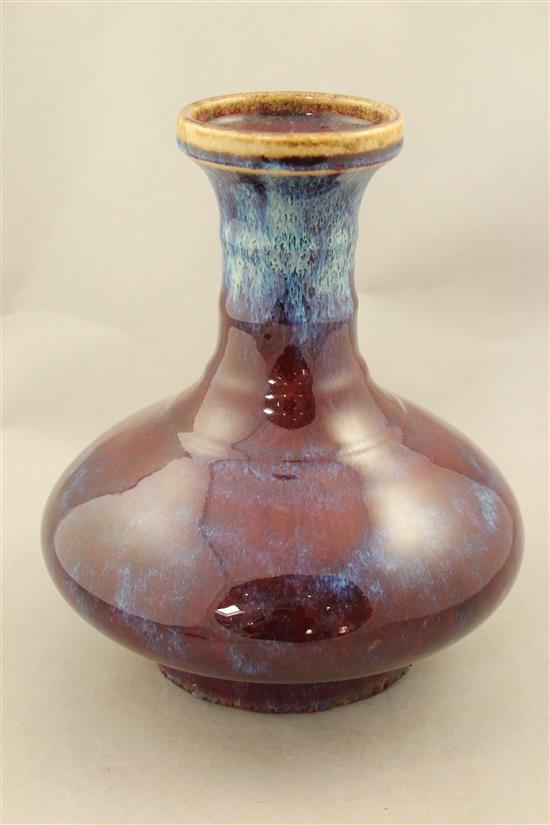 A Chinese flambe glazed bottle vase, Yongzheng mark but later, 26cm